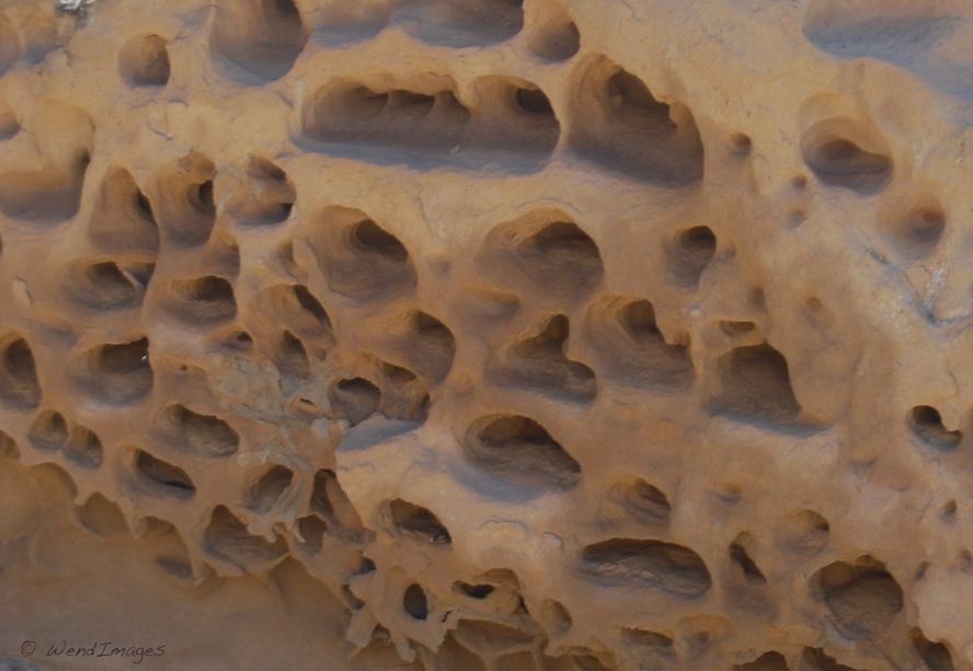 Rock perforations in Chaco Canyon